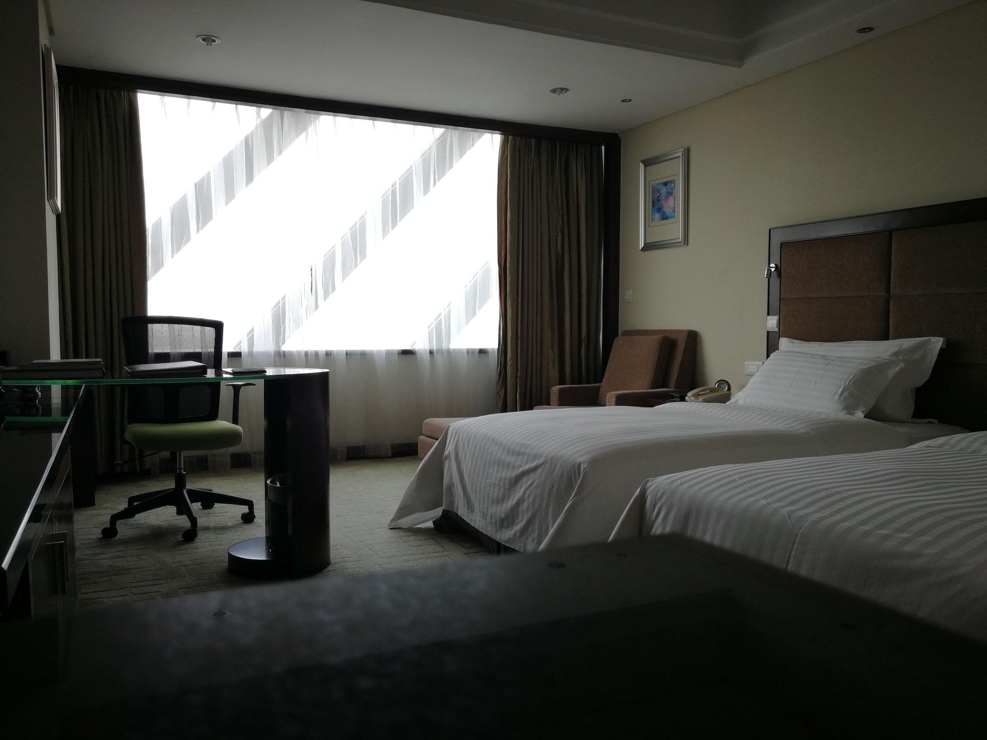 גואנגג'ואו Daysun International Hotel מראה חיצוני תמונה
